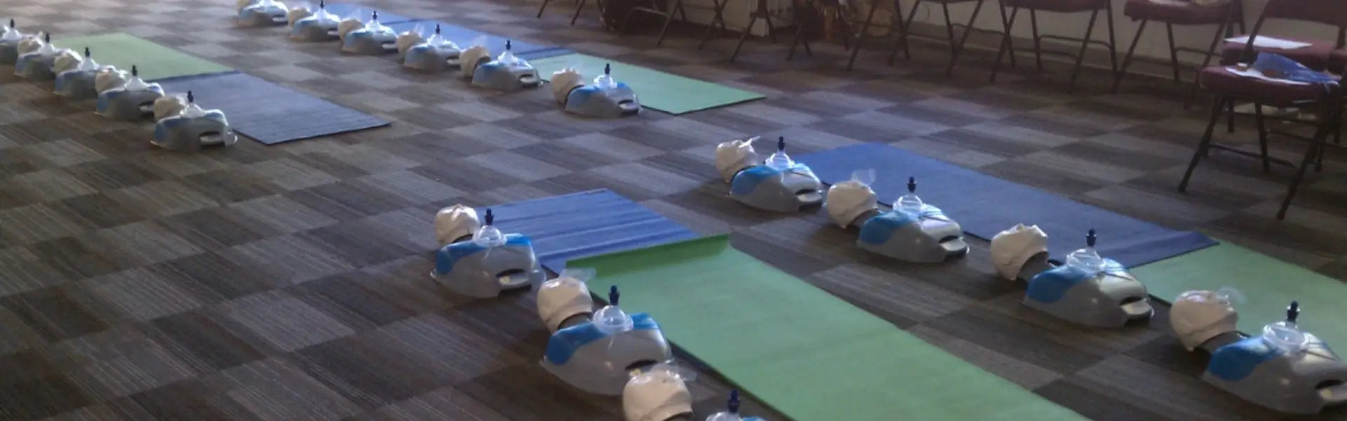 Multiple small skeleton on a checkered floor with blue mats